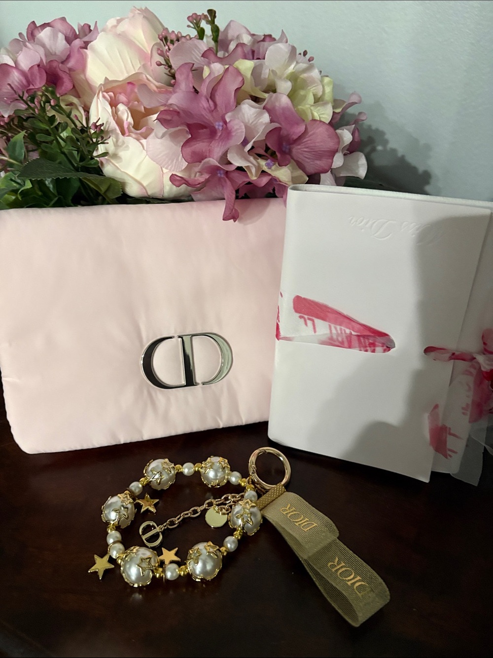 Dior Pale Pink CD Logo Clutch with Gold Charm Bracelet